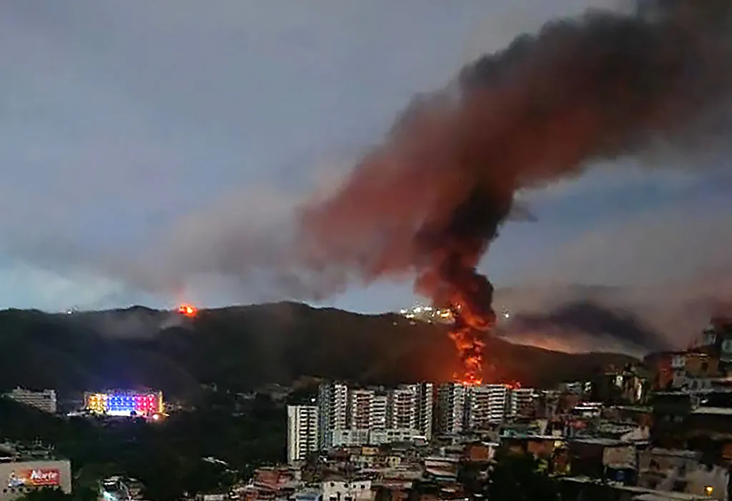 Incendio en Fuerte Tiuna, serie de explosiones en Caracas el 3 de enero.Fotógrafo: STR/AFP/