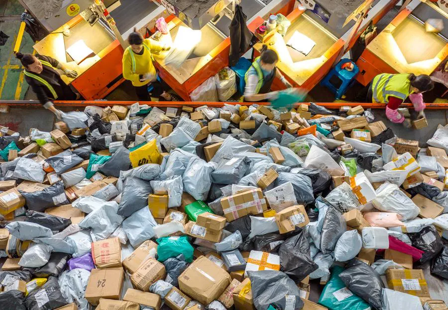 Empresa de entrega urgente en el Distrito de Changxing. (Xinhua/Tan Yunfeng)